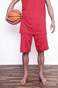 He's tall because he plays basketball.